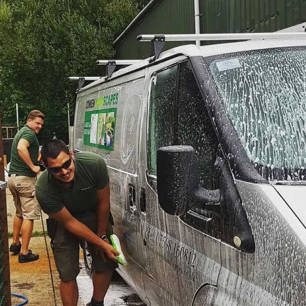 Our team are ready for your Questions to ask a potential landscaper, once they've finished washing the van.