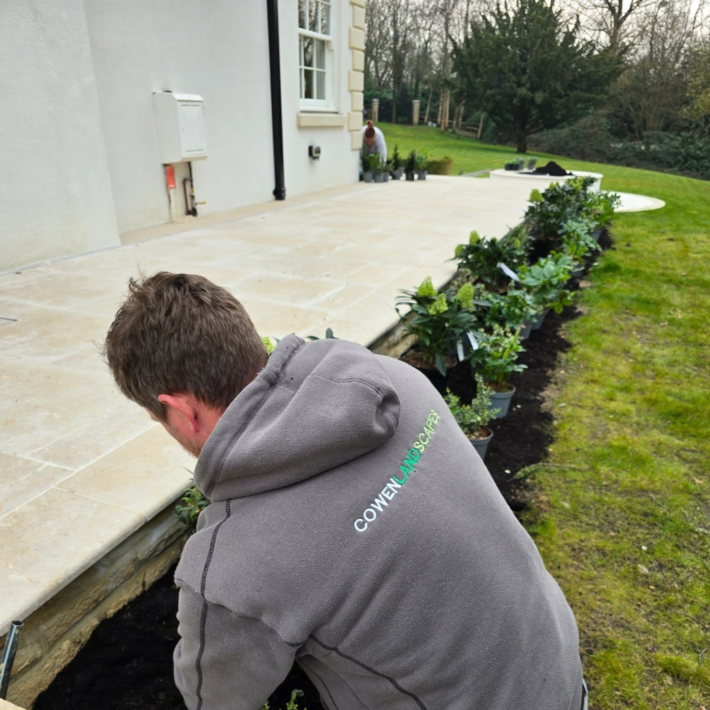 Man planting border