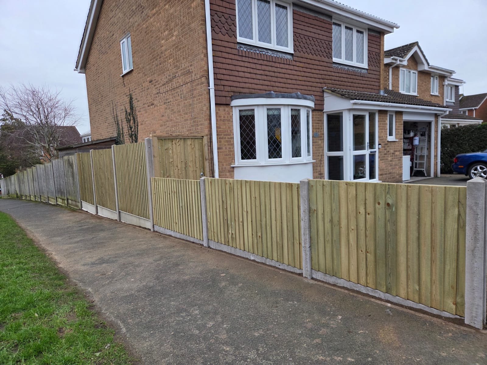 New timber boundary fencing with concrete posts beside a semi-detached house in Maidstone